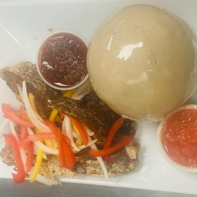 D20. Banku with fish (croaker).